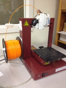 Photograph of a 3D printer.